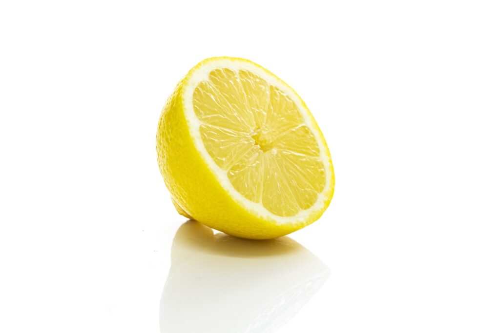 cut lemon on white background